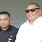 Ketua DPD Partai Golkar Bone Bolango Zainudin Pedro Bau ketika mendapingi Rusli Habibie (Anggota Fraksi Partai Golkar DPR-RI sekaligus Anggota Komisi XII) Pada Pelaksanaan Kunjungan Kerja Daerah (Kundapil) di Bone Bolango, tepatnya di Kecamatan Botupingge, Sabtu (10/5).