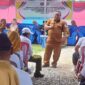 Arfan Luwiti, Panitia Pelaksana Bimtek Peningkatan Manajerial Kepala Sekolah Jenjang TK, SD, dan SMP, Batch 2 Tahun 2025, saat memberikan arahan usai pembukaan Bimtek oleh Bupati Ismet Mile bertempat di Danau Perintis Desa Boludawa Kecamatan Suwawa, Senin (14/7).