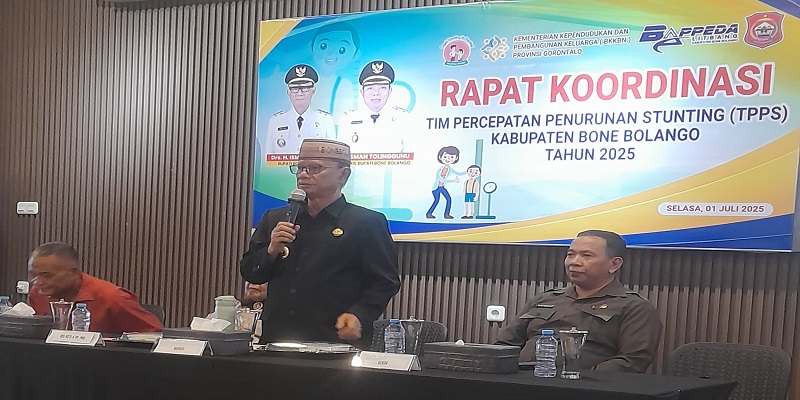 Sambutan Bupati Ismet Mile dalam Rapat Koordinasi (Rakor) Team Percepatan Penurunan Stunting (TPPS) Bone Bolango Tahun 2025 yang dilaksanakan pada Selasa (1/7/2025), di Naffil Resto dan Café.