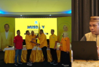 Zainudin Pedro Bau, Ketua DPD Golkar Bone Bolango terpilih Hasil Musda Ke-V, (kiri) dan Ketua Koperasi Global Akses Sejahtera (GASS) Bahrun Usman, S.Fil.I (kanan).