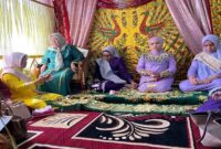 Prosesi Adat Moloopu, Camat Baru Kecamatan Tilongkabila Fekty Ika Dewi Wartabone, Selasa (17/2/2026). Foto. Yudi/Prokopim